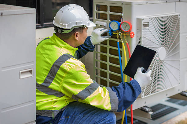 Professional Air Conditioning Repair technician working in McChord AFB, WA